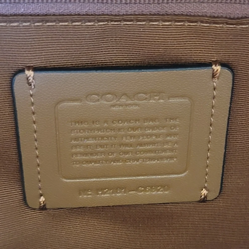 Coach Signature Brown Tan Backpack with Pink Trim and Purple Accent